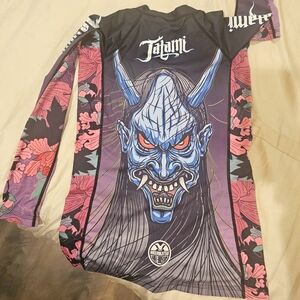 Medium Woman's BJJ jiujitsu rashguard.
